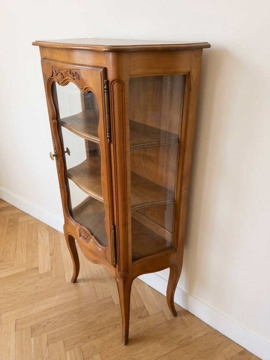 Small silver display cabinet in Louis XV style made of wood.