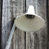Old articulated workshop lamp in painted metal