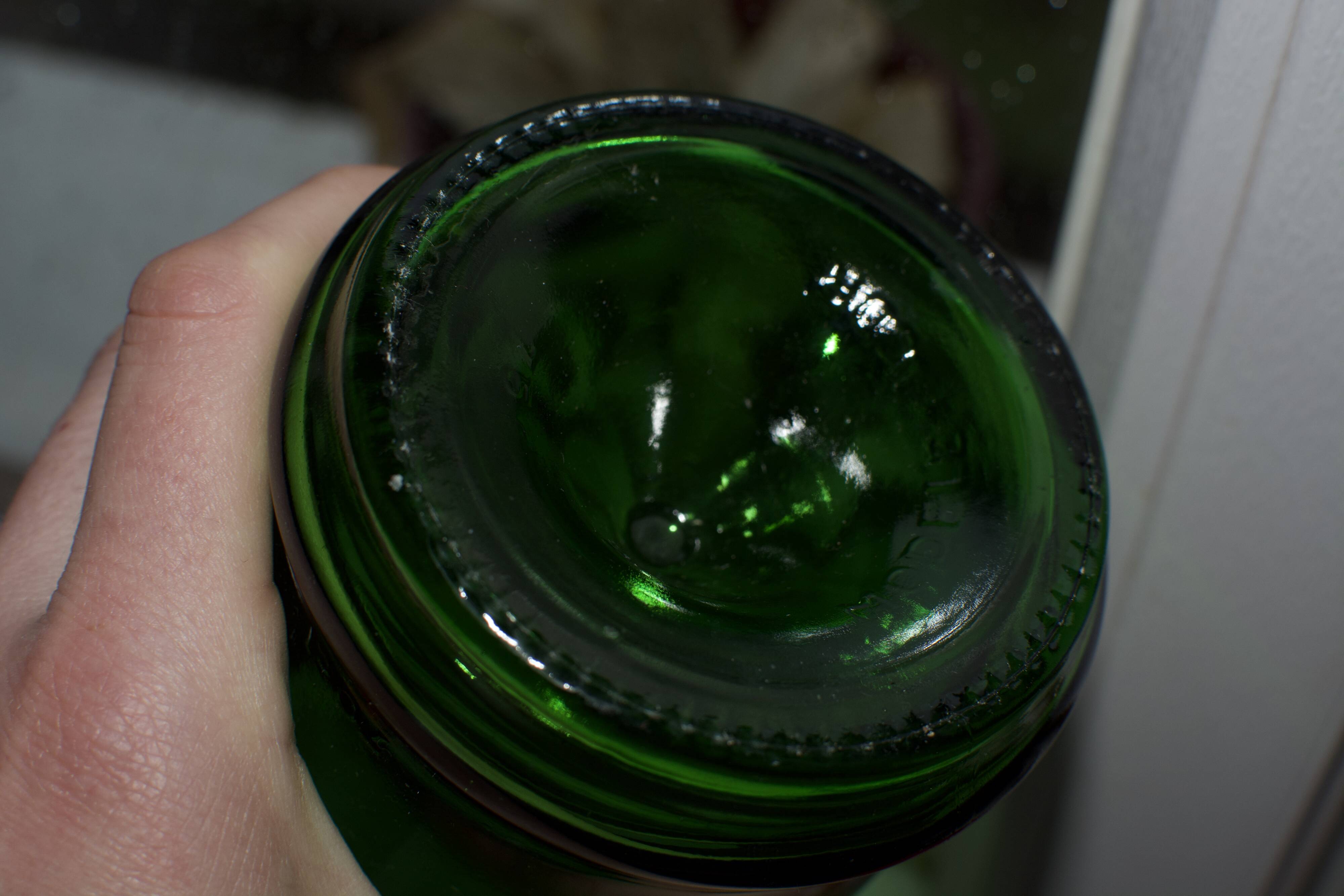 Vintage green glass bottle