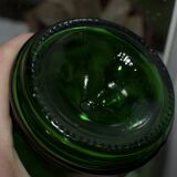Bouteille vintage en verre vert