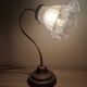 Bronze gooseneck desk lamp and glass paste