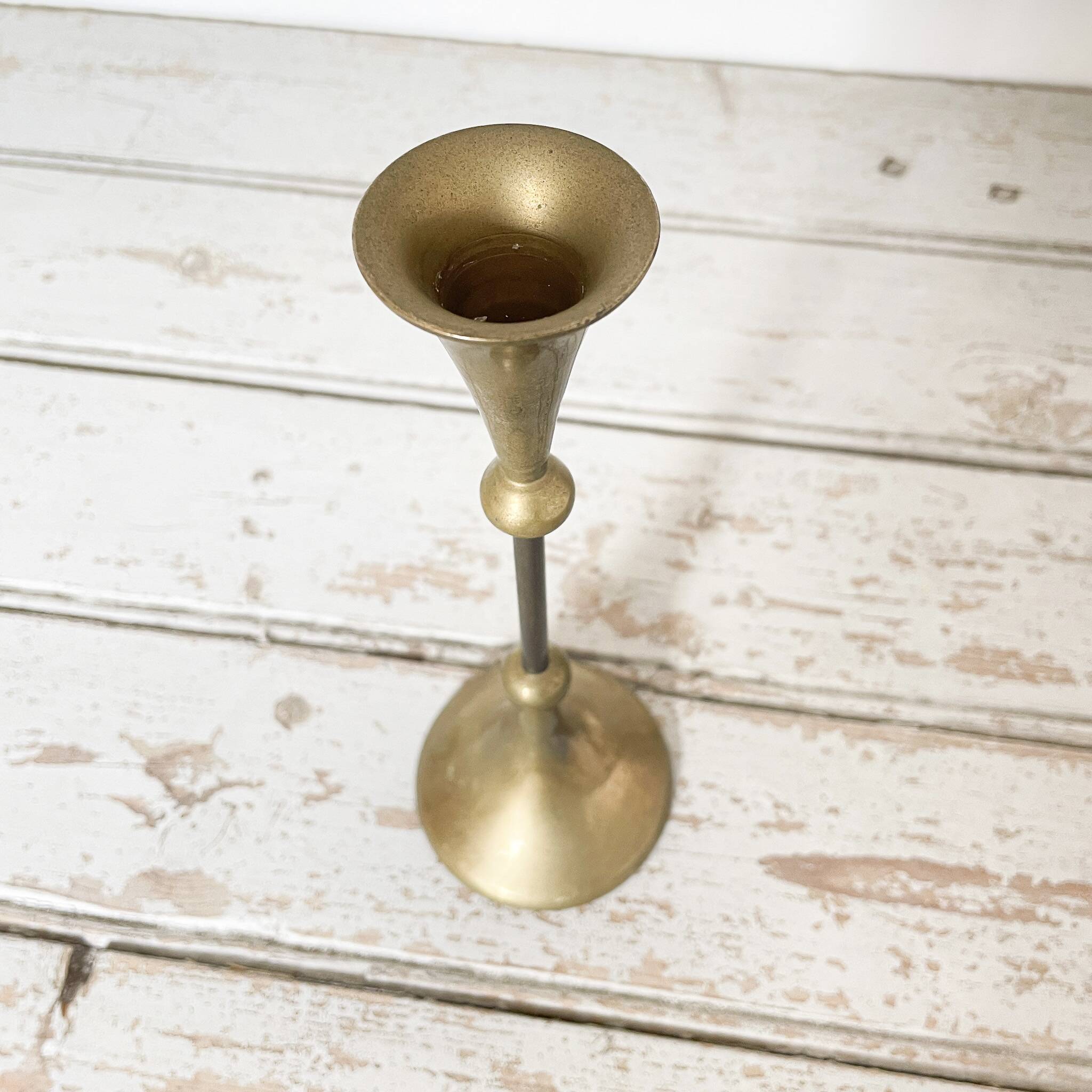 Tapered brass candle holder
