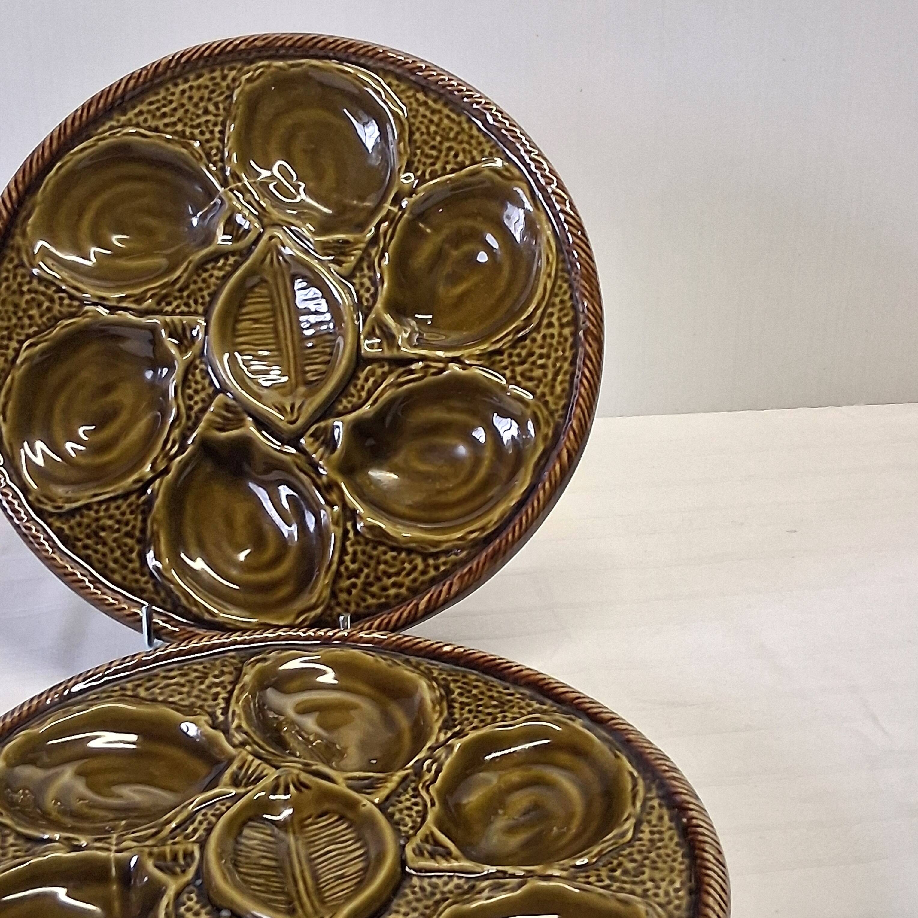 3 green majolica oyster plates from St Clément in good condition.