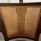 Ancien fauteuil de barbier / coiffeur en cannage