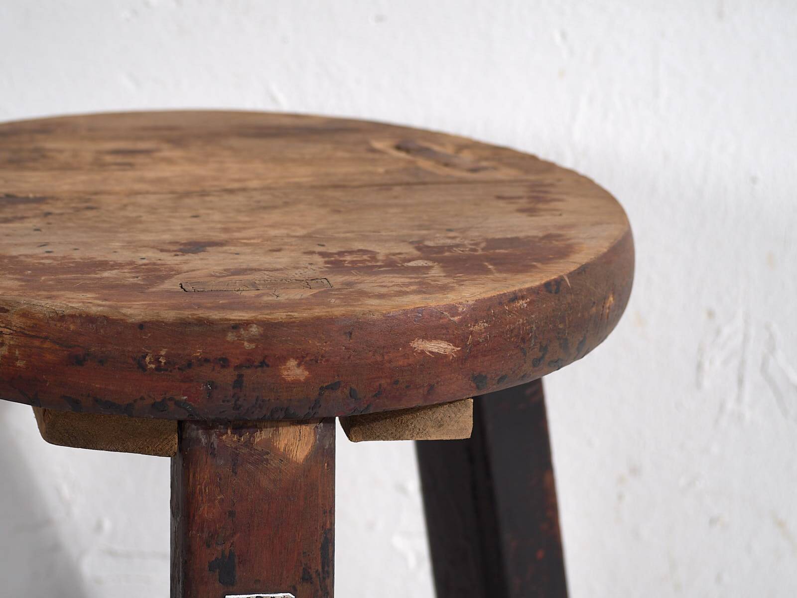 Antique round dark colored stool (c.1900)