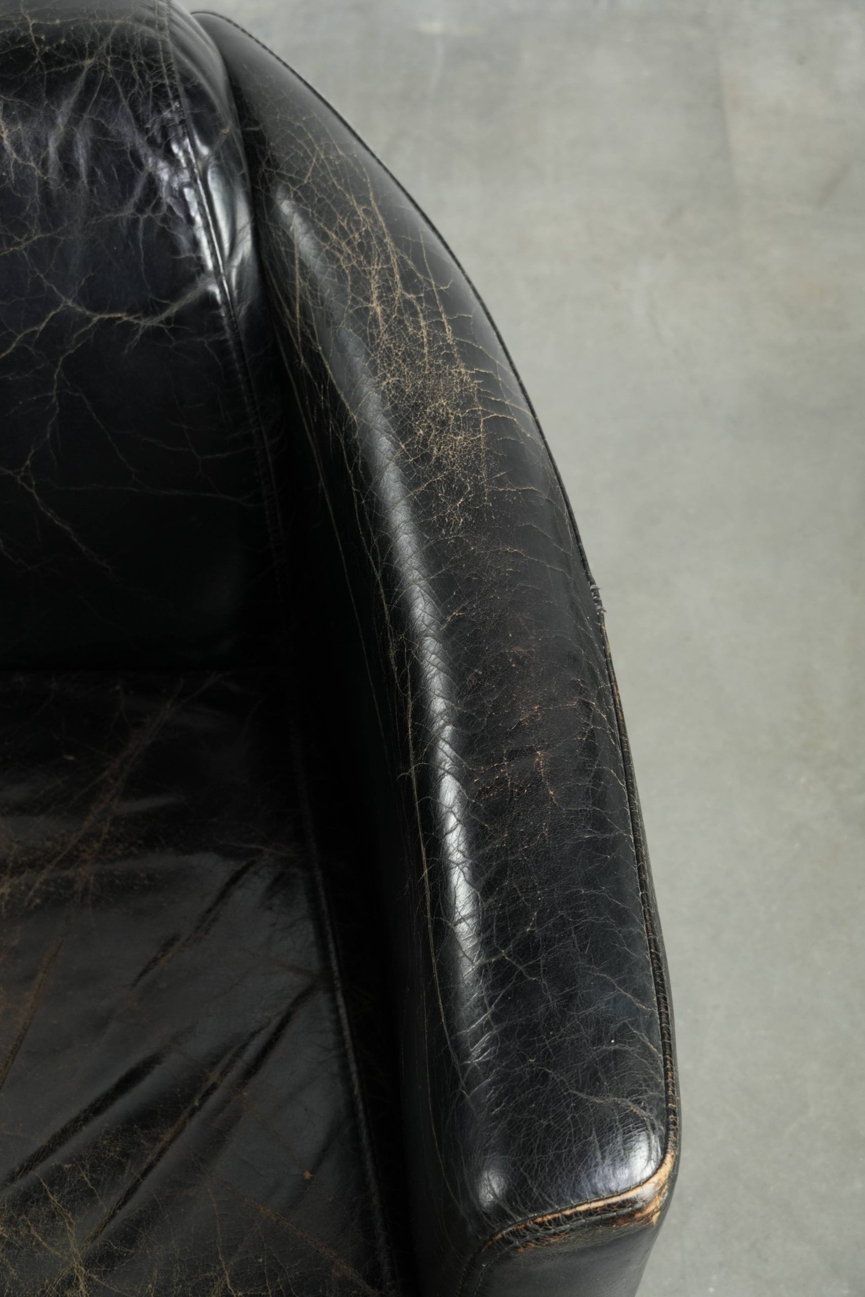 Set of two black vintage cowhide aviator design armchairs