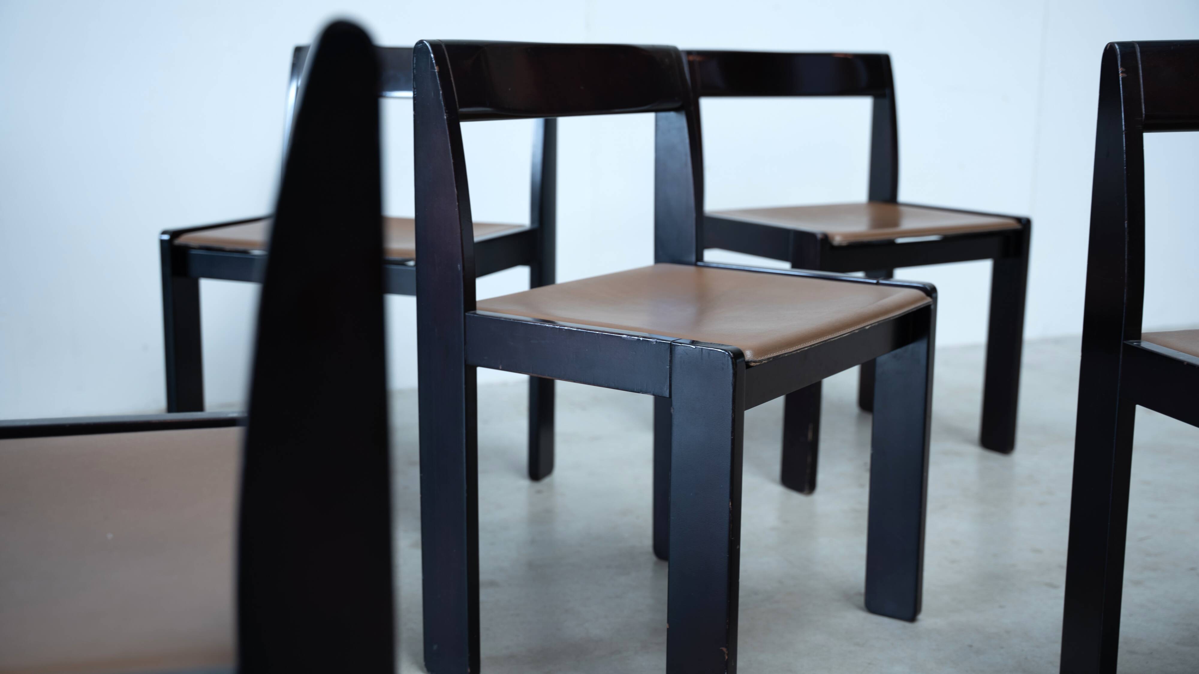 Set of eight black lacquered dining chairs