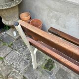 Bench in dark wood and white metal