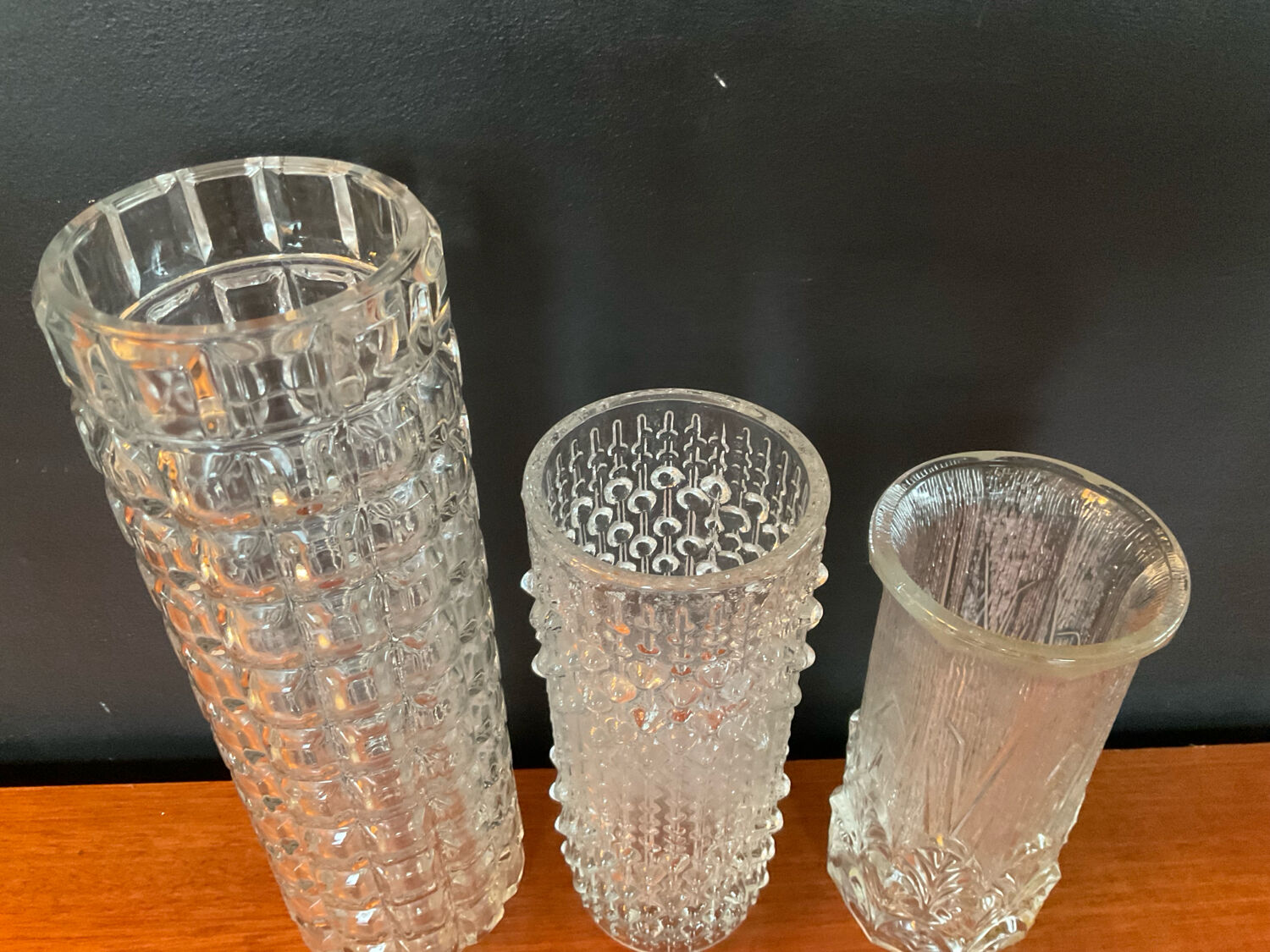 Vintage trio of moulded glass roll vases