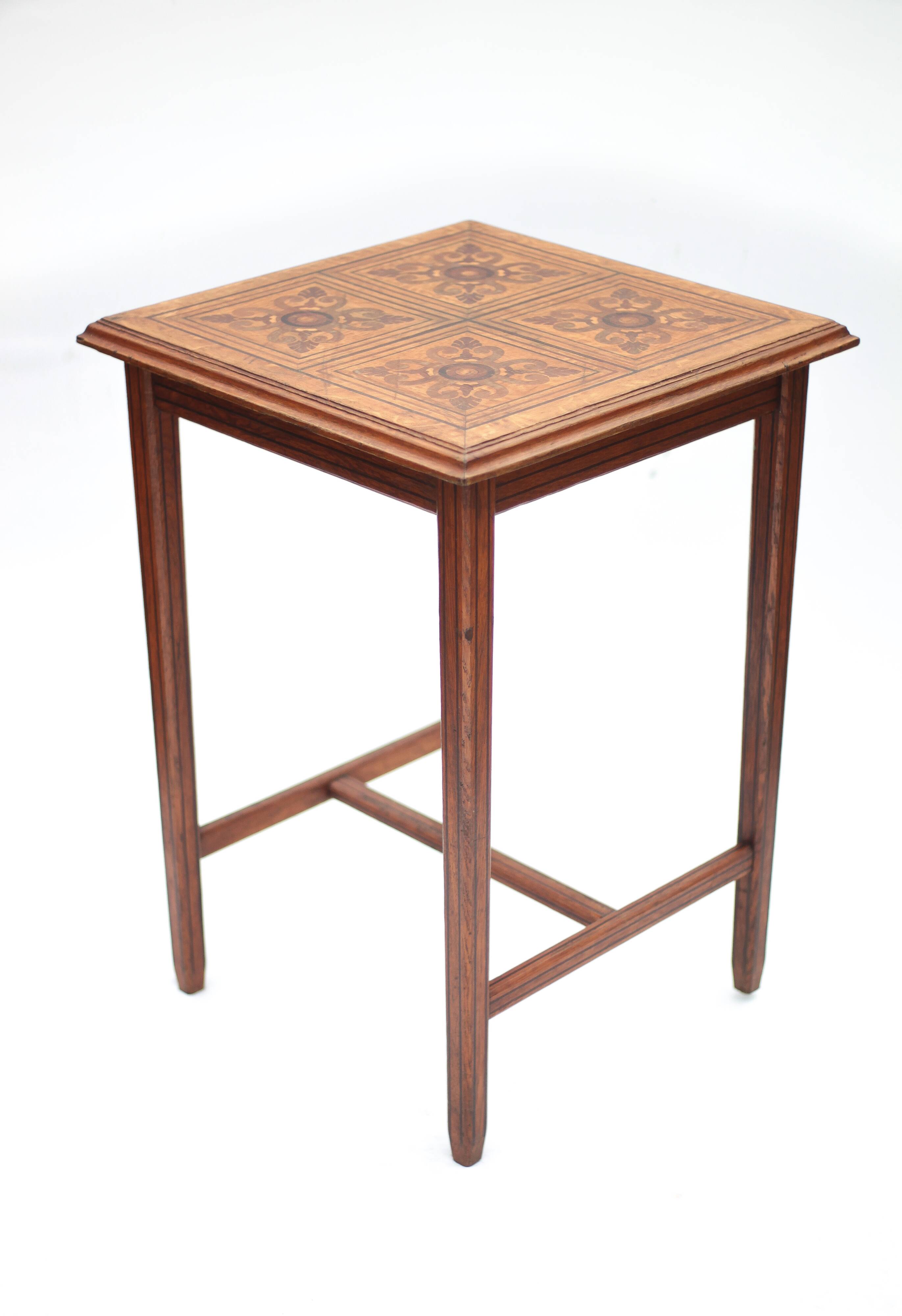 Wood table with marquetry, table with an antique parquet top, antique table.