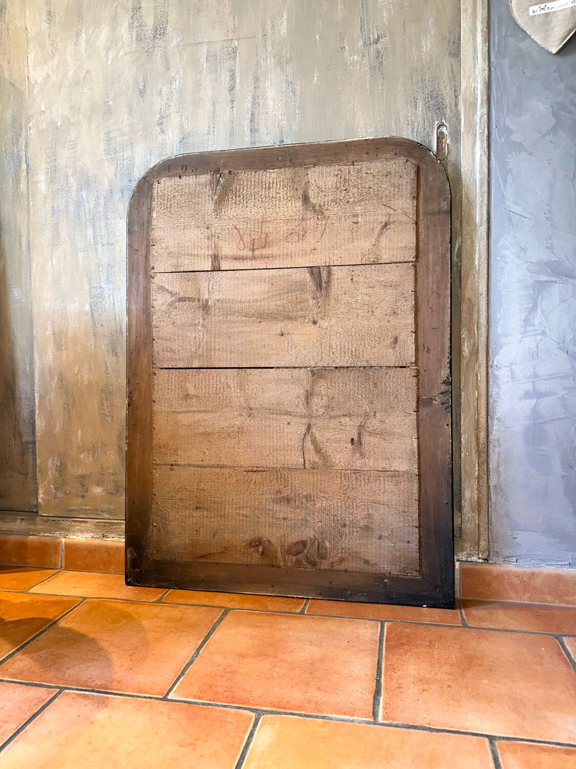 Louis-Philippe black and gold antique mirror from the 19th century