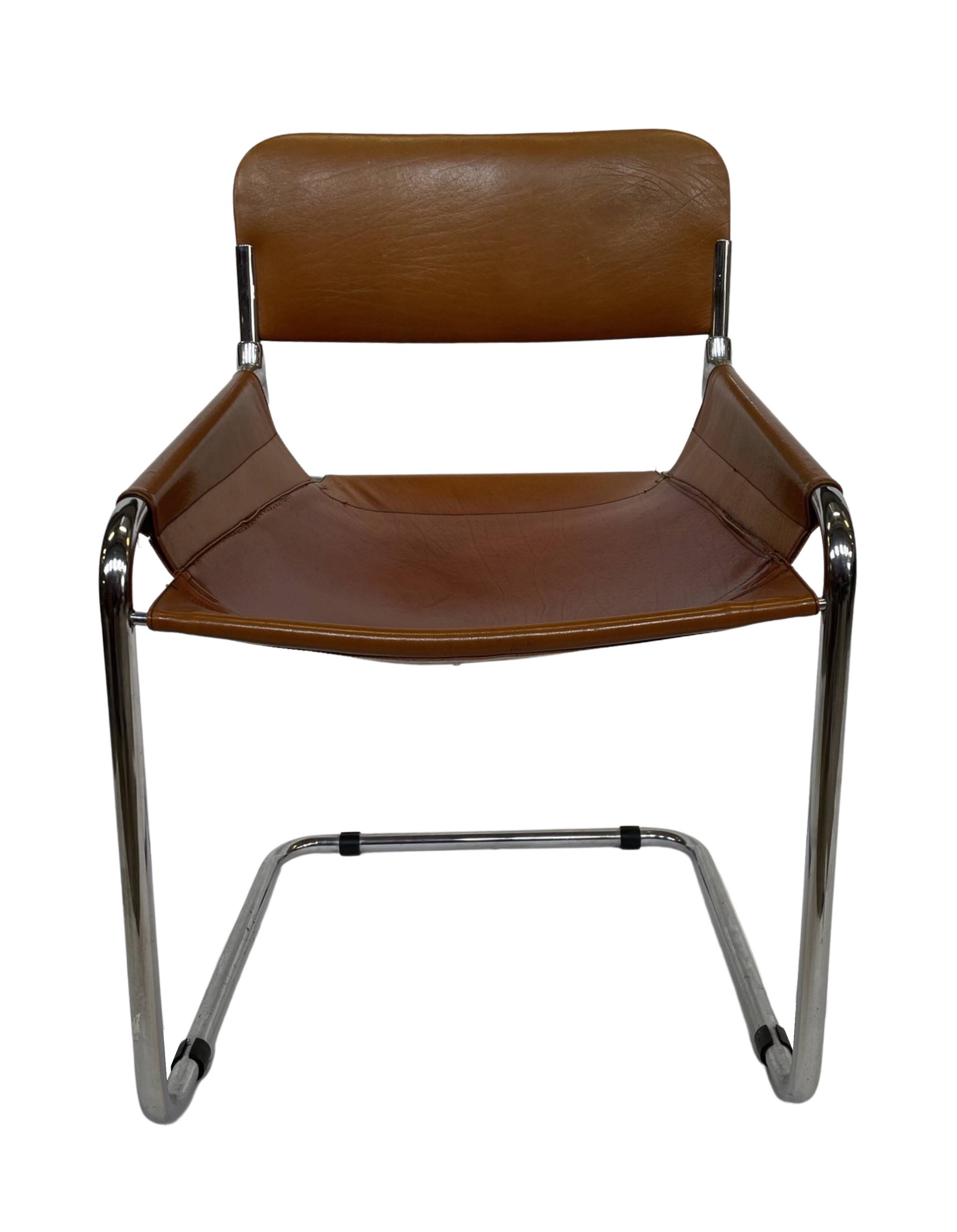 vintage dining room chair in cognac leather and chrome 1970s Italy