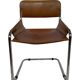 vintage dining room chair in cognac leather and chrome 1970s Italy