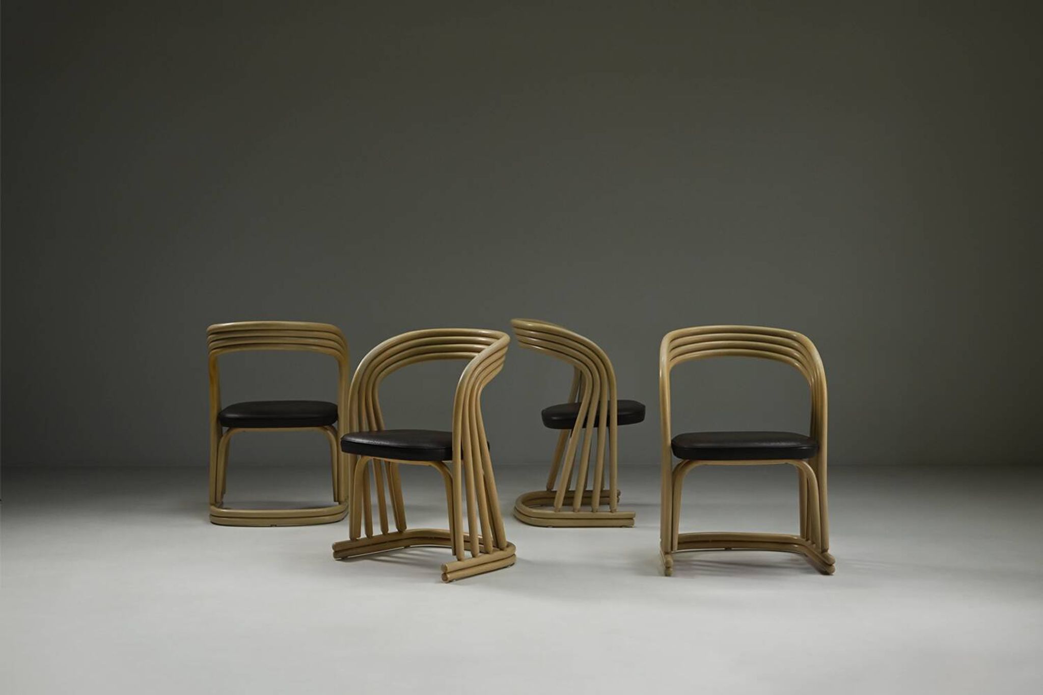 Set of 4 rattan dining chairs, 1980s Italy.