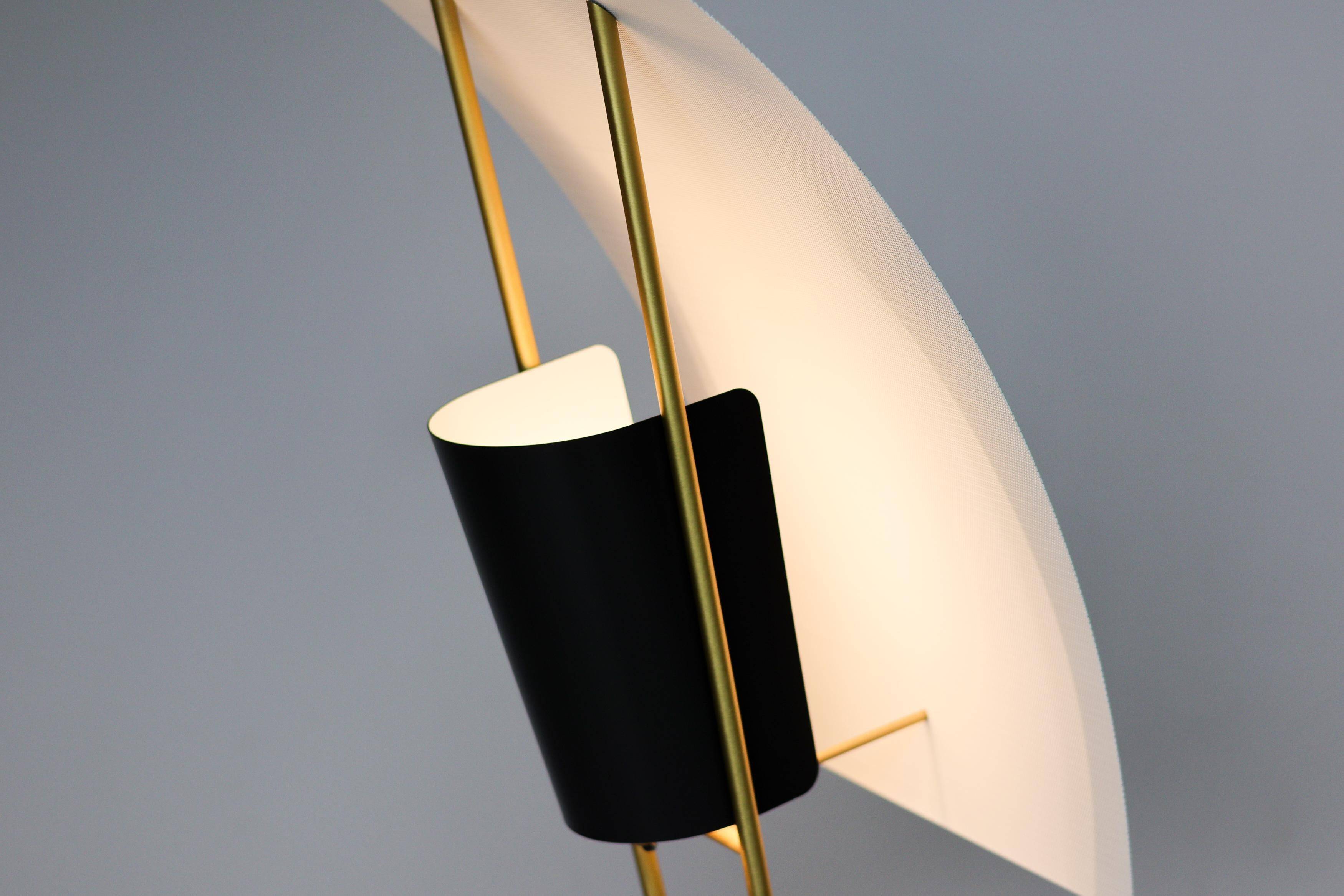 Kite floor lamp by Pierre Guariche, brass and steel, mid-20th century.