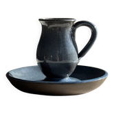 Vintage hand-held candlestick in blue glazed stoneware with floral decoration by Poterie Millian.