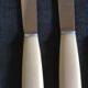 Set of 10 table knives in white Bakelite