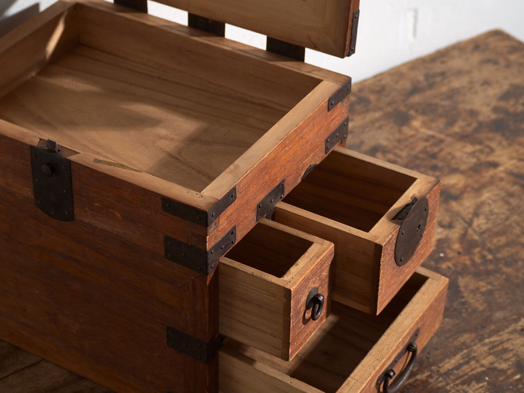 Japanese ko-dansu with hinged lid and paulownia wood drawers, Meiji–Taishō period, circa 1868–1926.