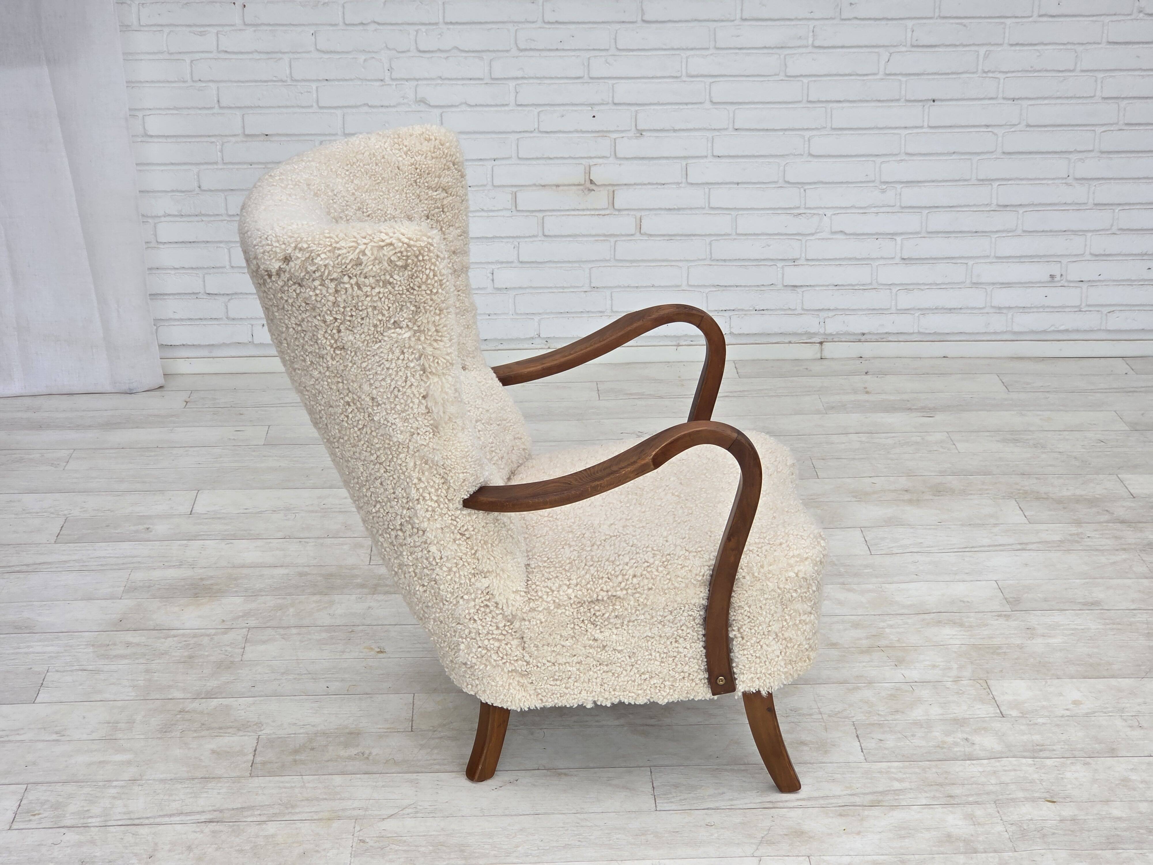 1960s, Danish design by Alfred Christensen, reupholstered, sheepskin.