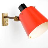 Old and rare Stilnovo wall light, red and black lacquered metal and brass With period label