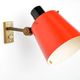 Old and rare Stilnovo wall light, red and black lacquered metal and brass With period label