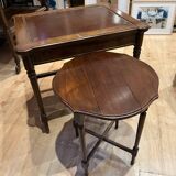 Classic nesting tables in wood and leather.