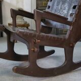 Armchair with ottoman by Angel Pazmino in wood and brown leather 1960's