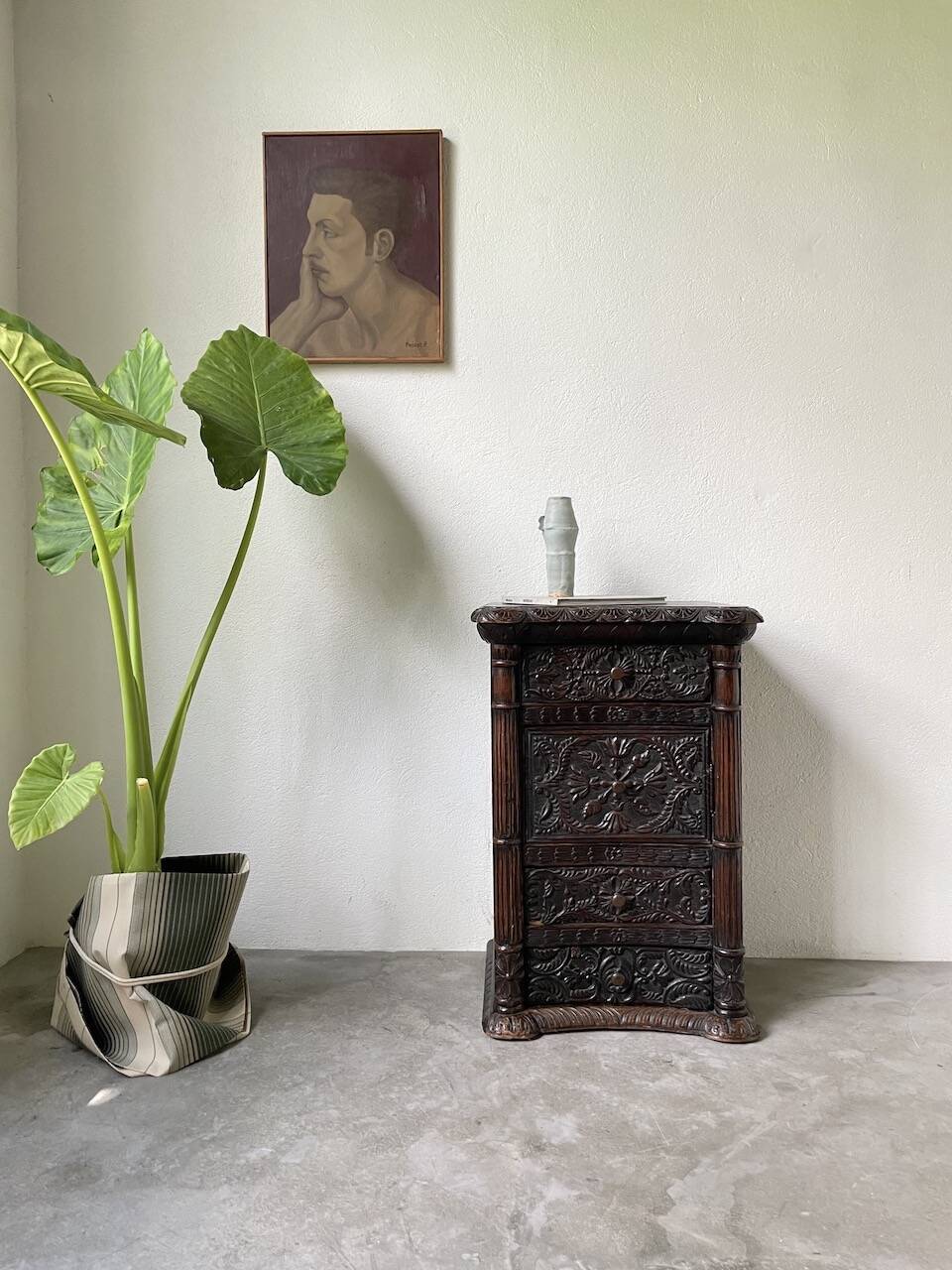 19th century chest of drawers in carved blackened pine