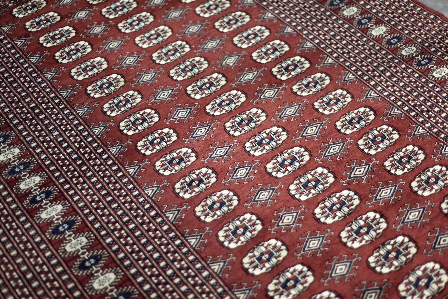 Handwoven red Boukhara oriental rug, 1960s