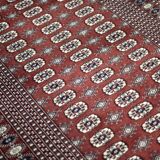 Handwoven red Boukhara oriental rug, 1960s