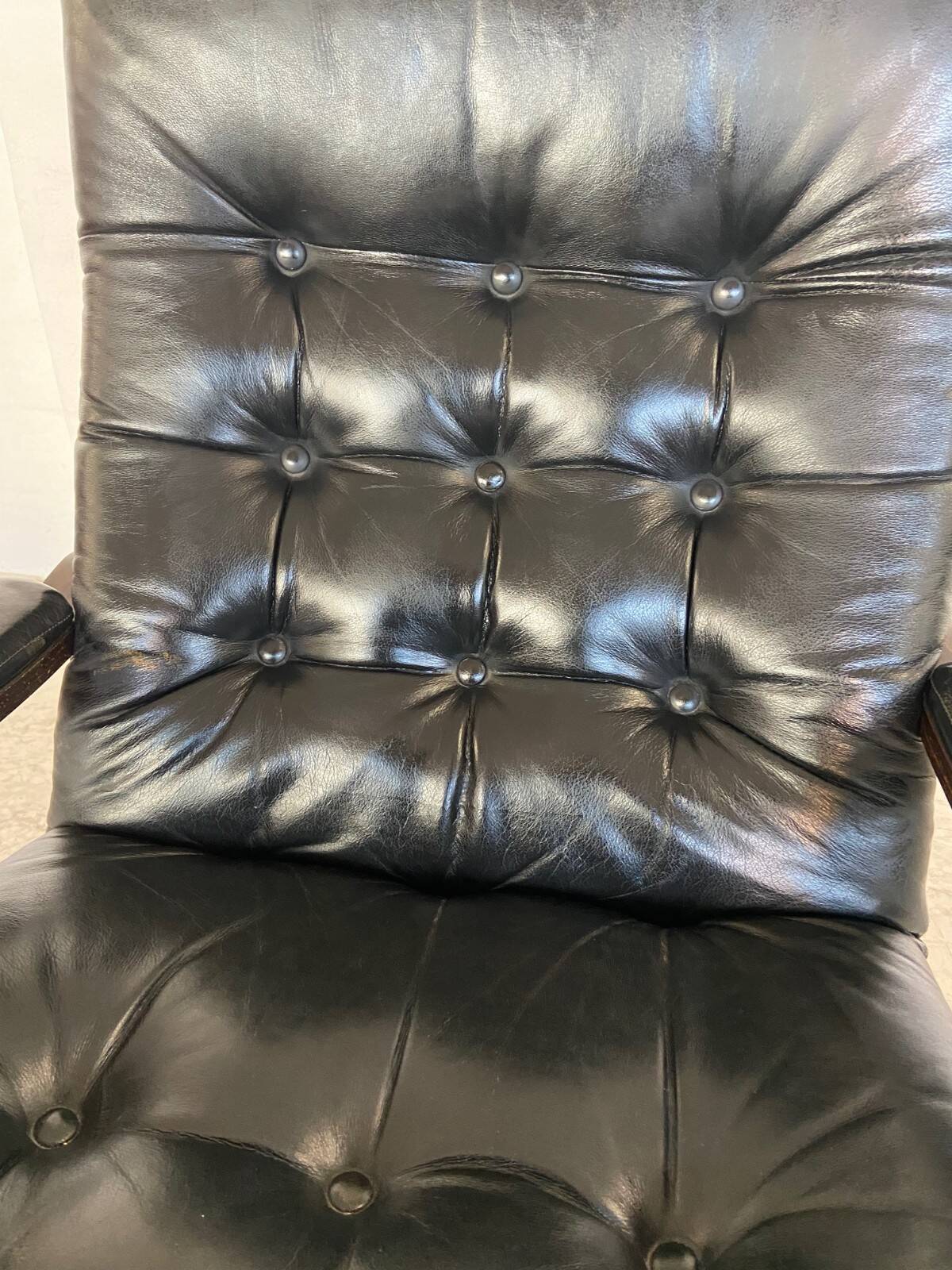 Vintage mid-century Scandinavian black leather lounge chair 1970s