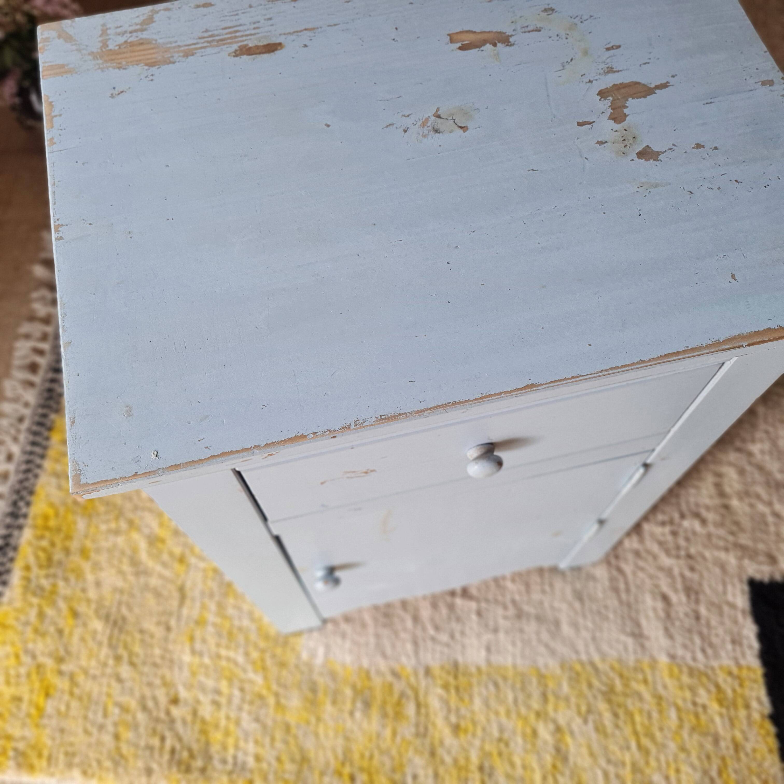 Handcrafted blue chest of drawers.