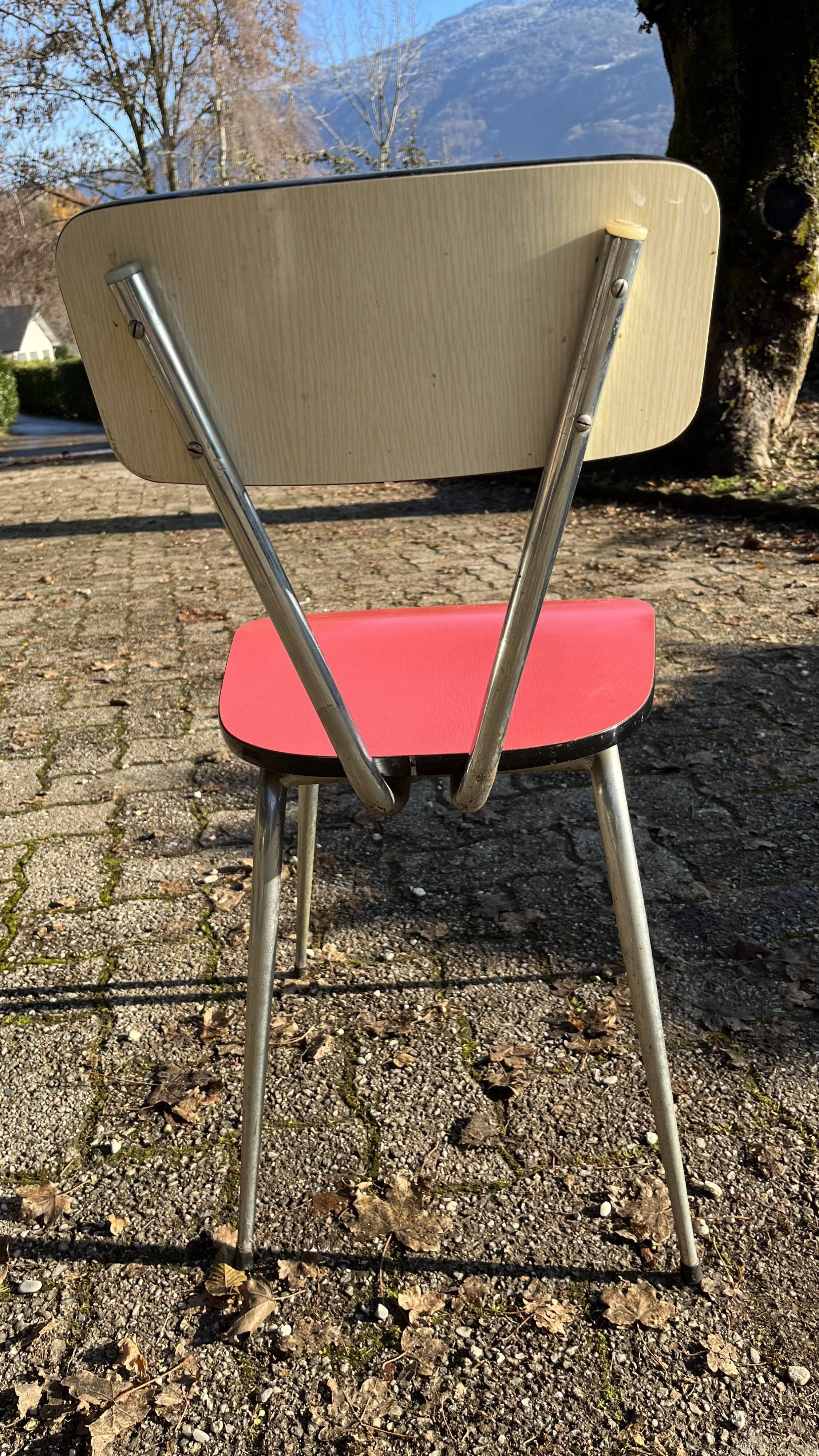 Red and cream Formica kitchen chairs