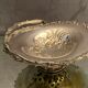 Cut basket basket handle on pedestal in silver metal with floral decoration