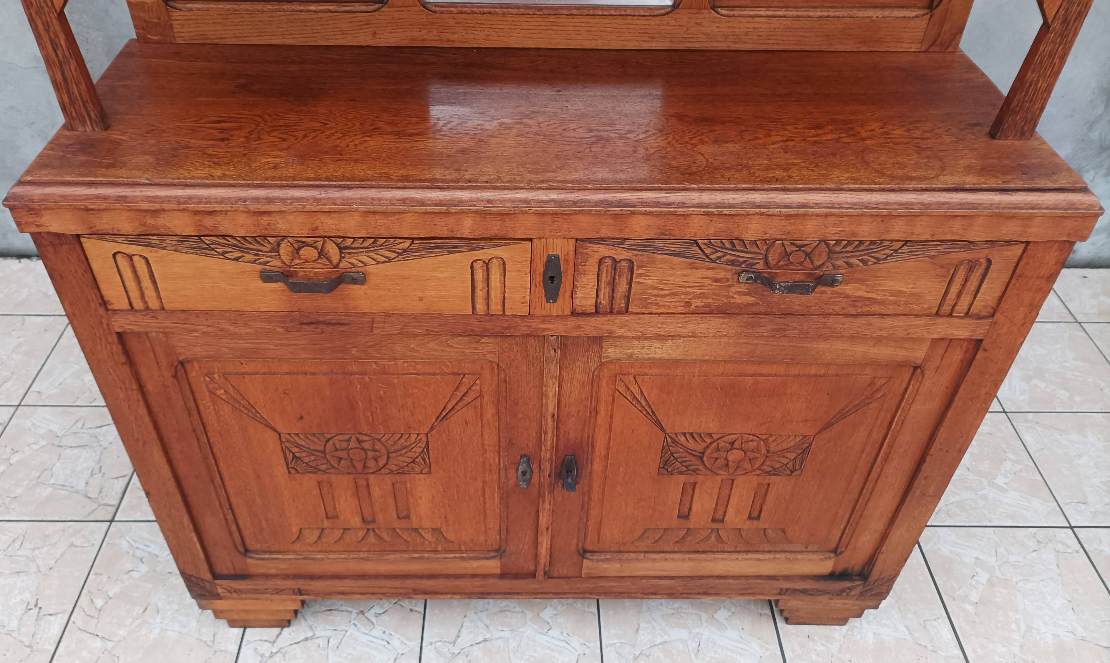 Art Deco period carved oak sideboard