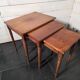 Nest of tables in solid cherry wood from the mid-20th century.
