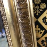 Miroir Empire à palmettes feuille d’or restauré