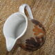 Glazed stoneware jug with hand decoration