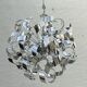 Sculptural chrome suspension design