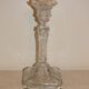 19th century candlestick in molded glass decorated with roses and lions