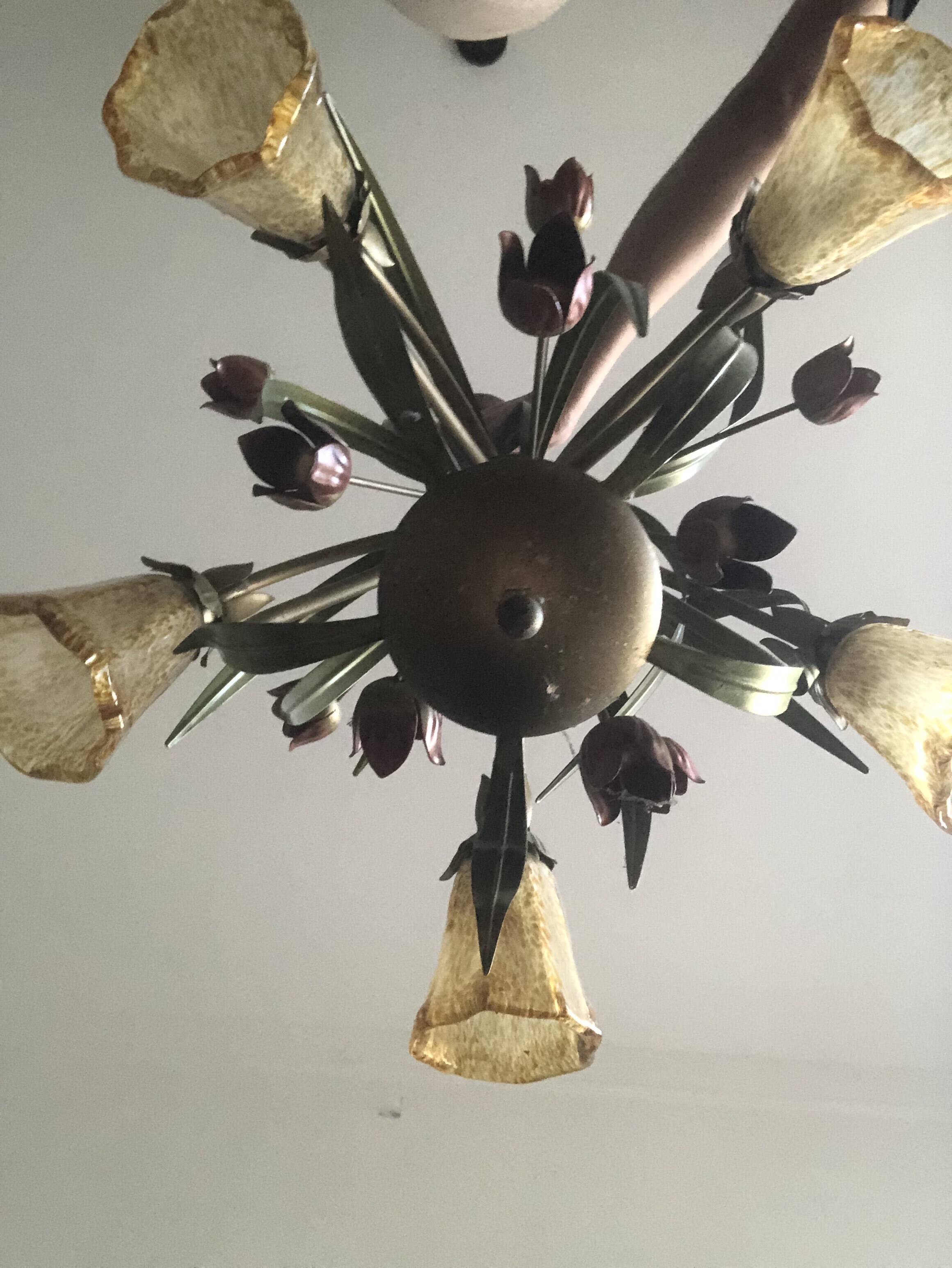 Antique Art Deco metal chandelier with a tinted glass shade.