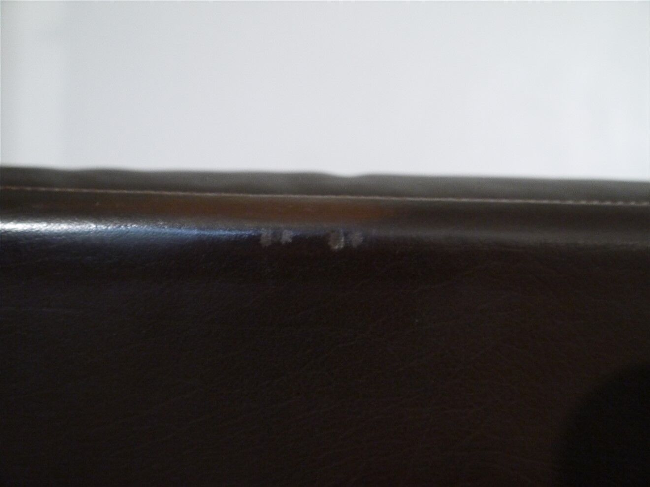 Pair of Scandinavian leather armchairs with ottomans 1970