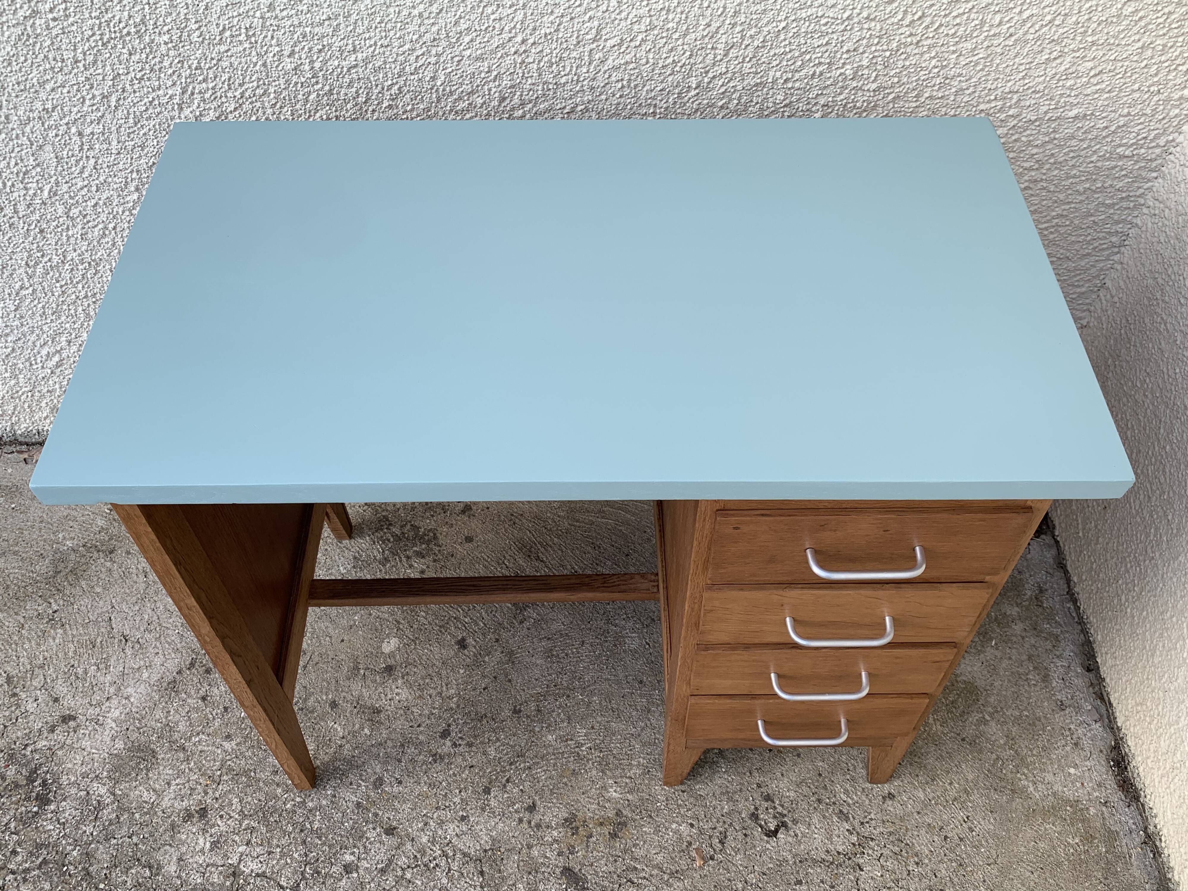 Vintage desk compass feet 1950 and its Baumann chair