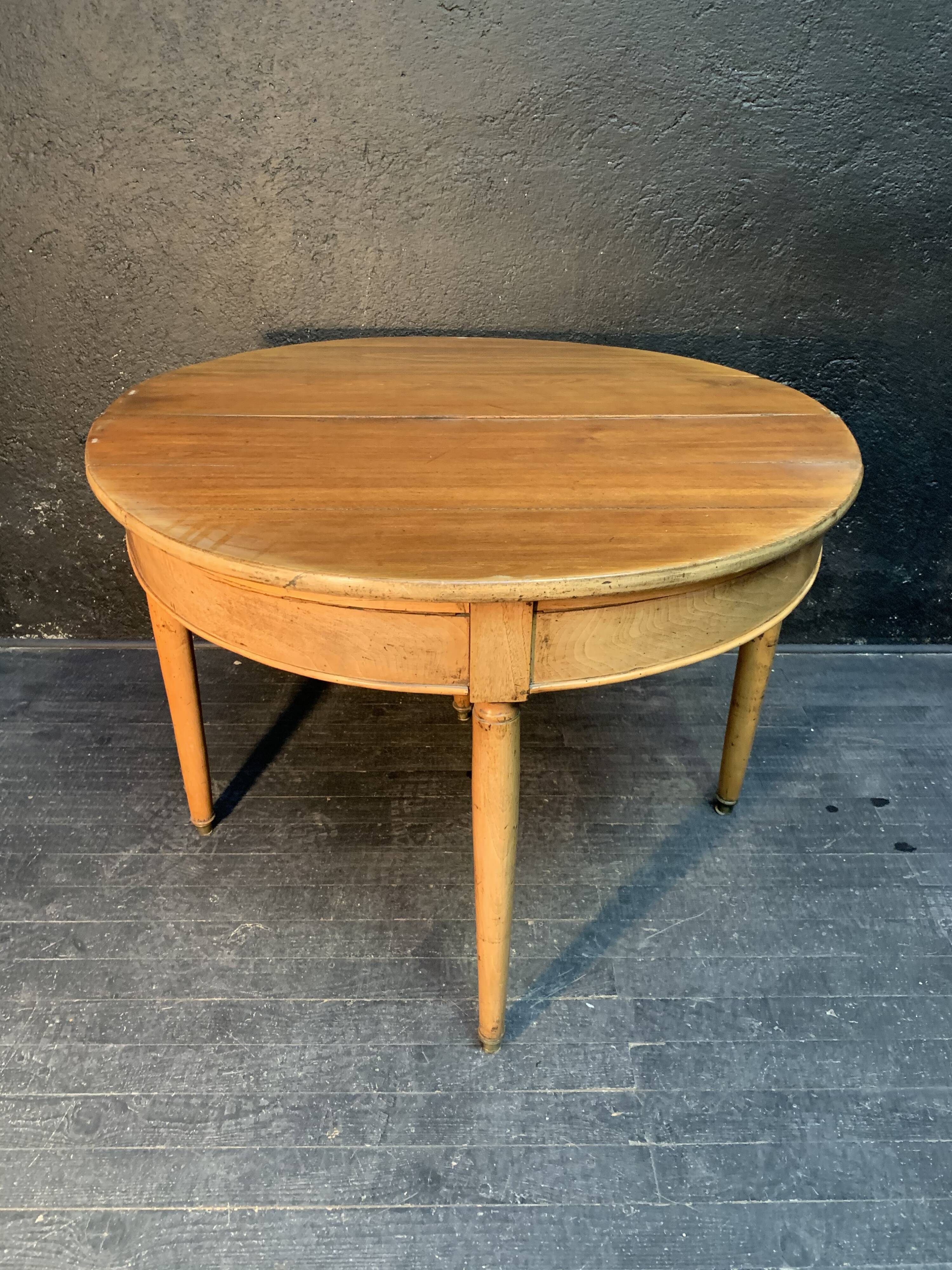 Former Louis XVI-style half moon table 19th century