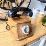 Old wooden dial crank telephone
