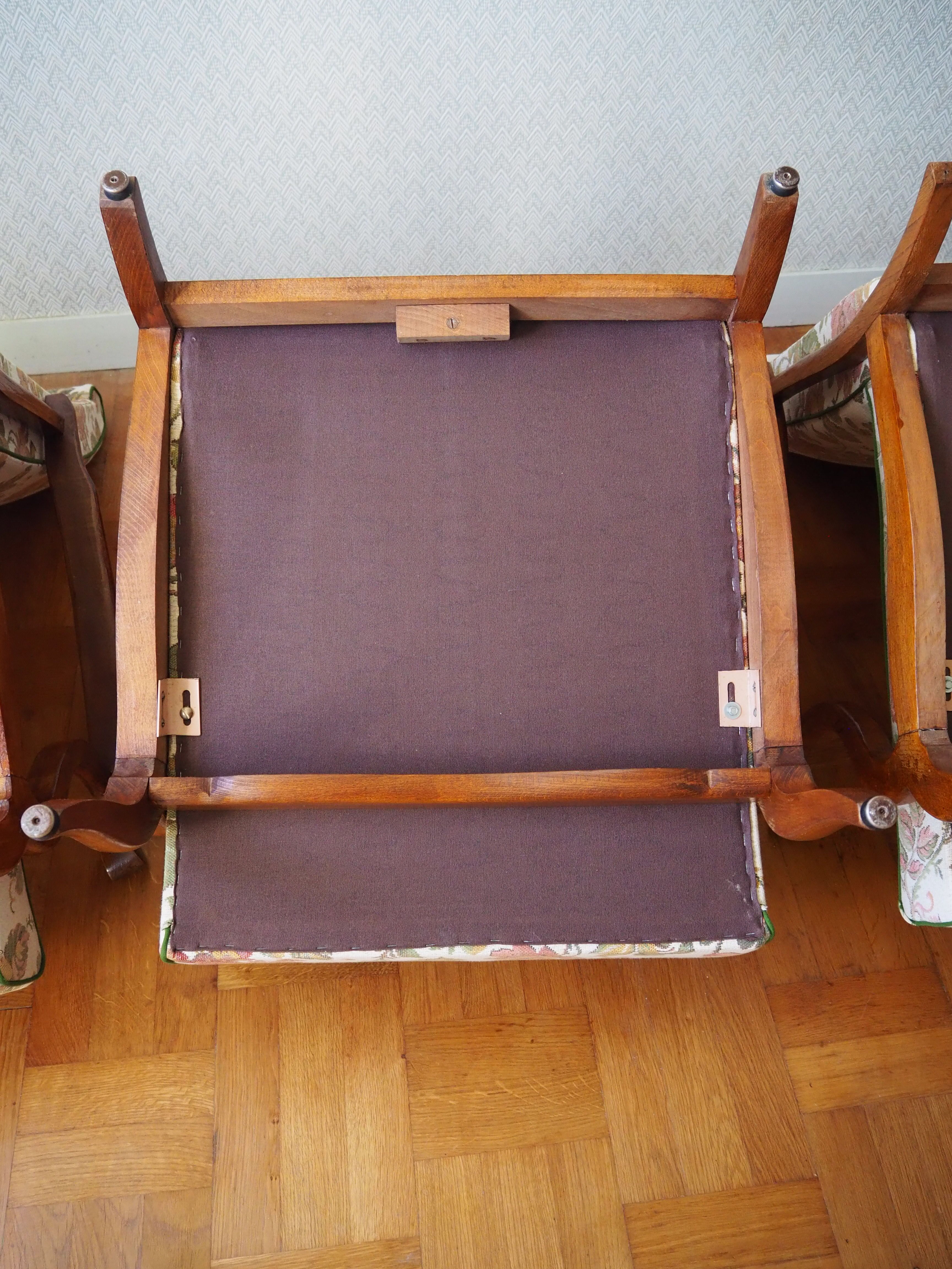 Four 1950s armchairs - wooden armrests