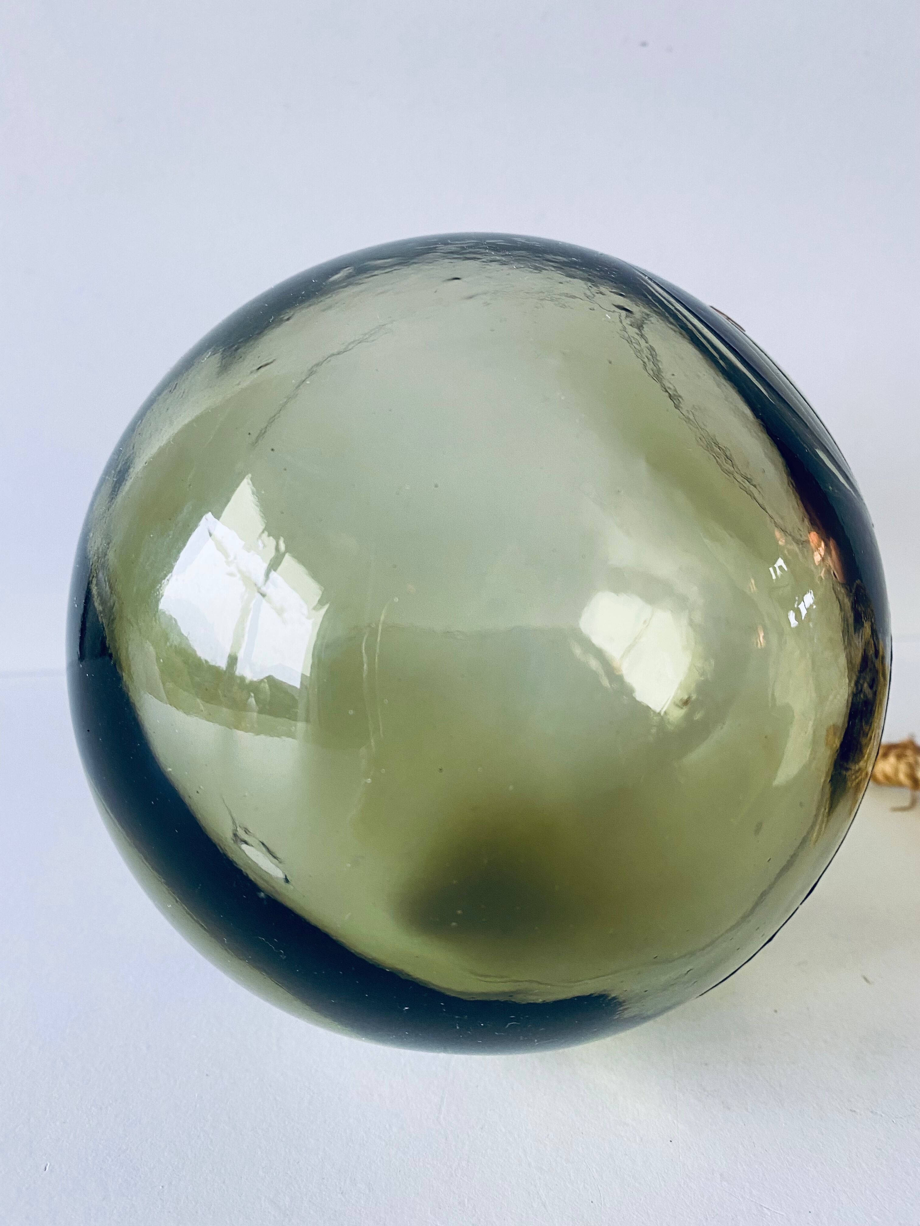 Old glass fishing float