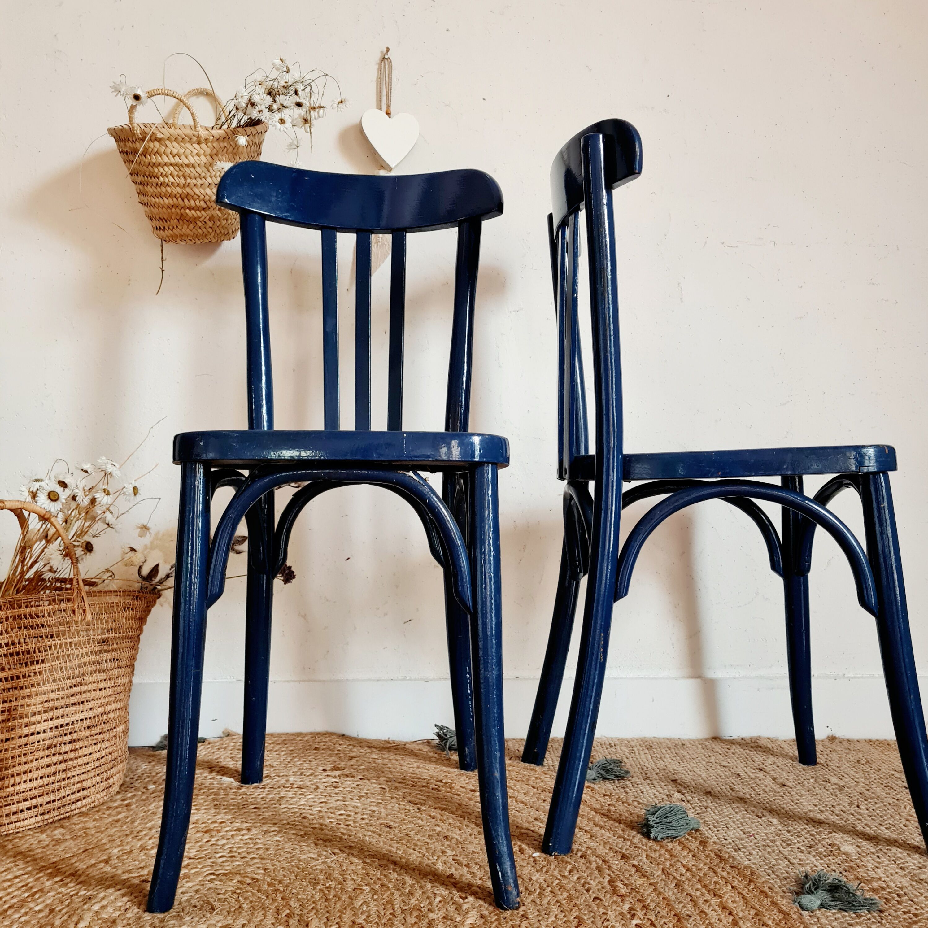 Duo of old blue bistro chairs
