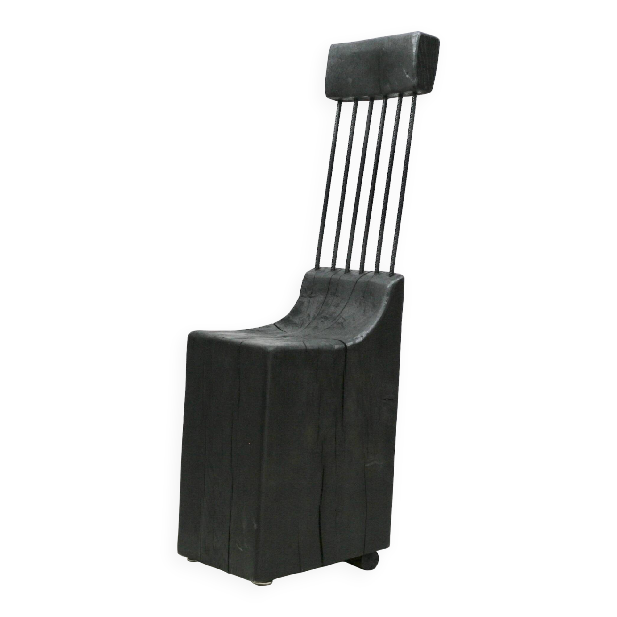 Brutalist chair, black-stained raw wood, steel. Work from the 1970s