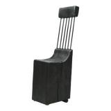 Brutalist chair, black-stained raw wood, steel. Work from the 1970s